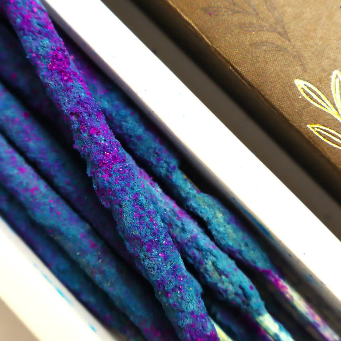 Warm Gum Rosin incense sticks burning