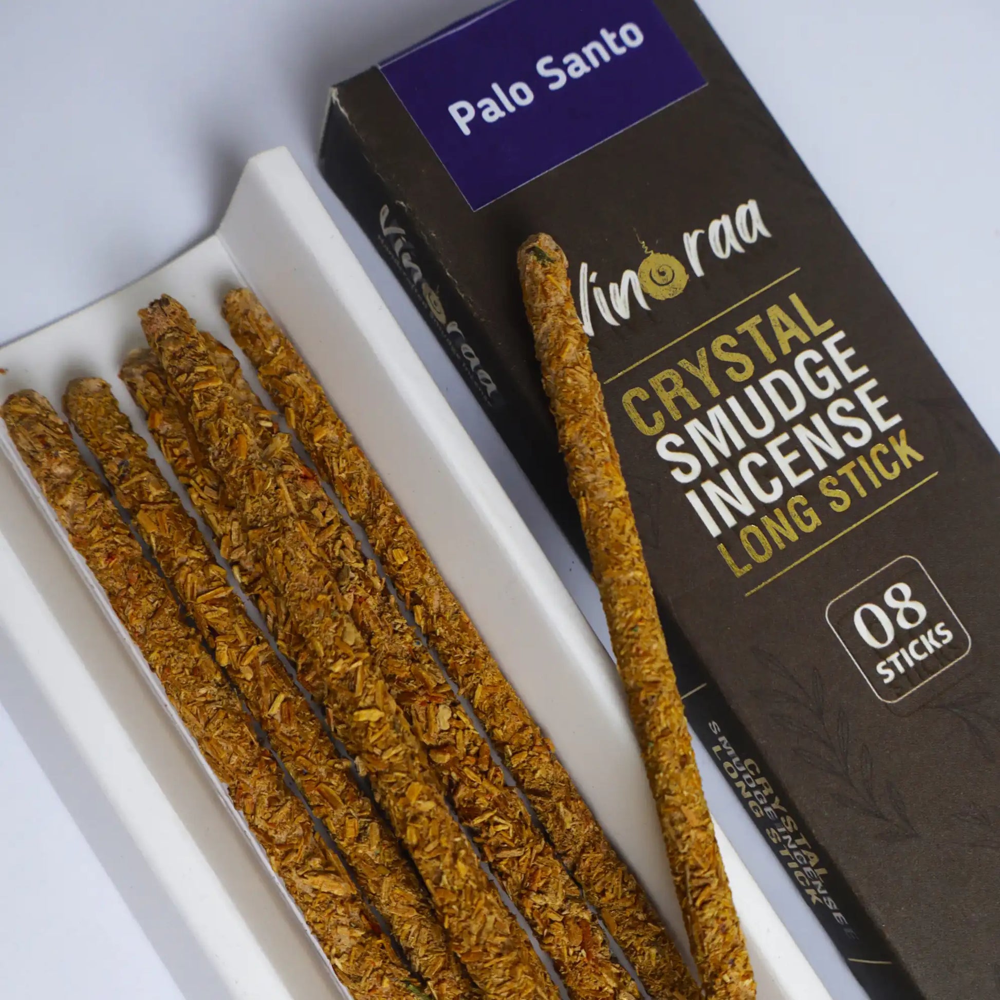 Sweet woody Palo Santo incense sticks burning